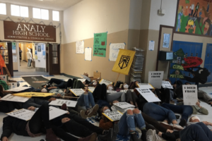 A staged "die-in" at Santa Rosa mall to demonstrate the perils of climate change