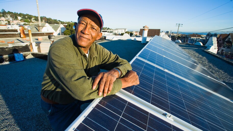Man with rooftop solar array