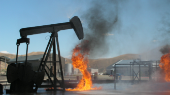 Oil pumpjack on fire. Photo by Canva.