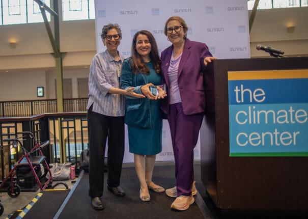 The Climate Center CEO Ellie Cohen (left) and Senate President pro Tempore Monique Limón (center), present Senator Eloise Gómez Reyes (right) with the 2026 California Climate Leadership Award. Photo by Lara Aburamadan / Survival Media Agency.