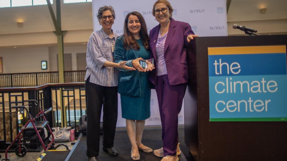 The Climate Center CEO Ellie Cohen (left) and Senate President pro Tempore Monique Limón (center), present Senator Eloise Gómez Reyes (right) with the 2026 California Climate Leadership Award. Photo by Lara Aburamadan / Survival Media Agency.
